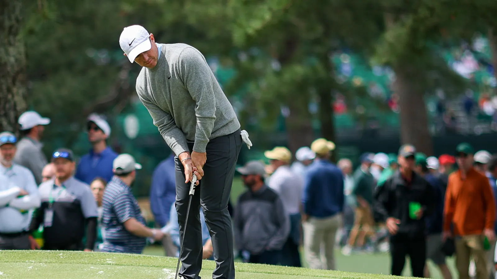 Rory McIlroy hits a putt during a practice round at the 2024 Masters